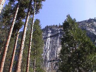 Smaller falls springing from cliff over the valley